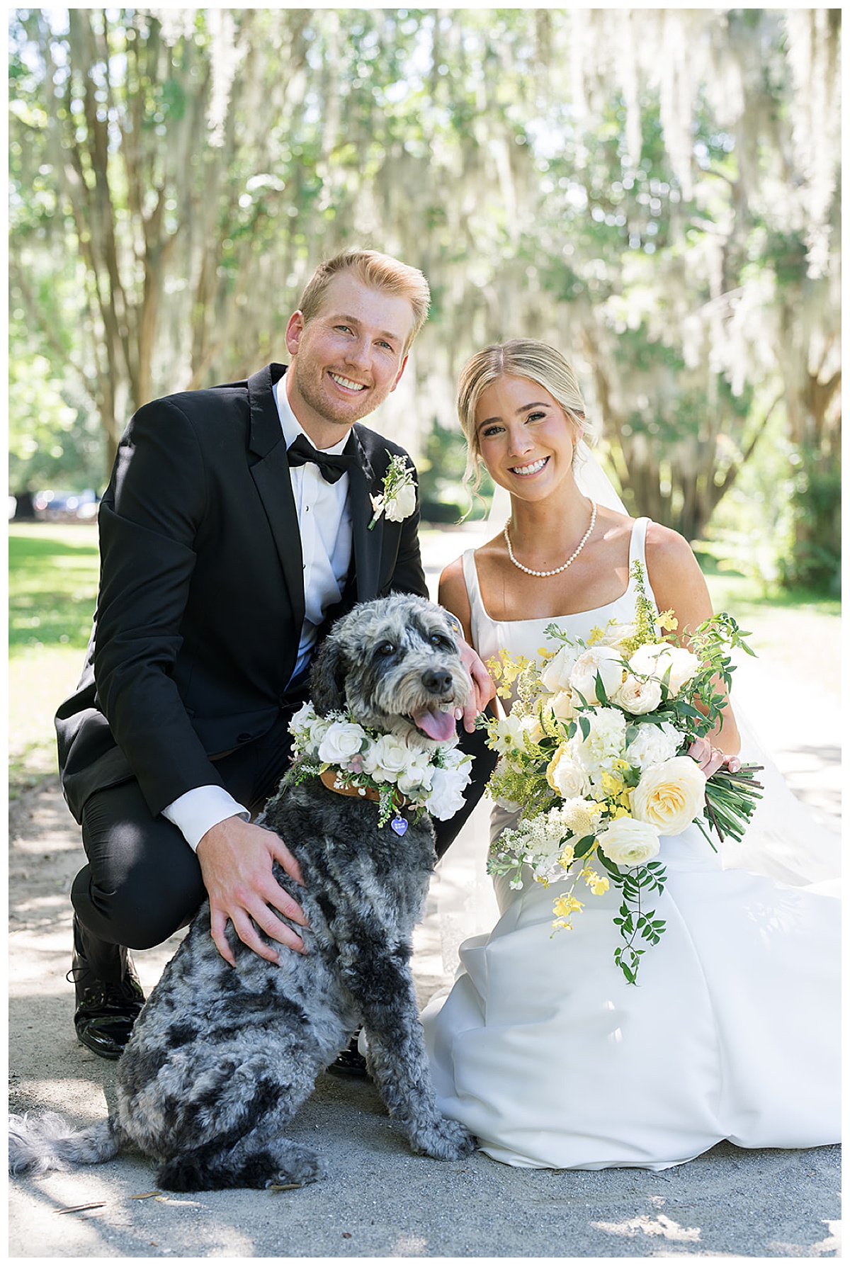 bride, groom, posed with dog with flower collar