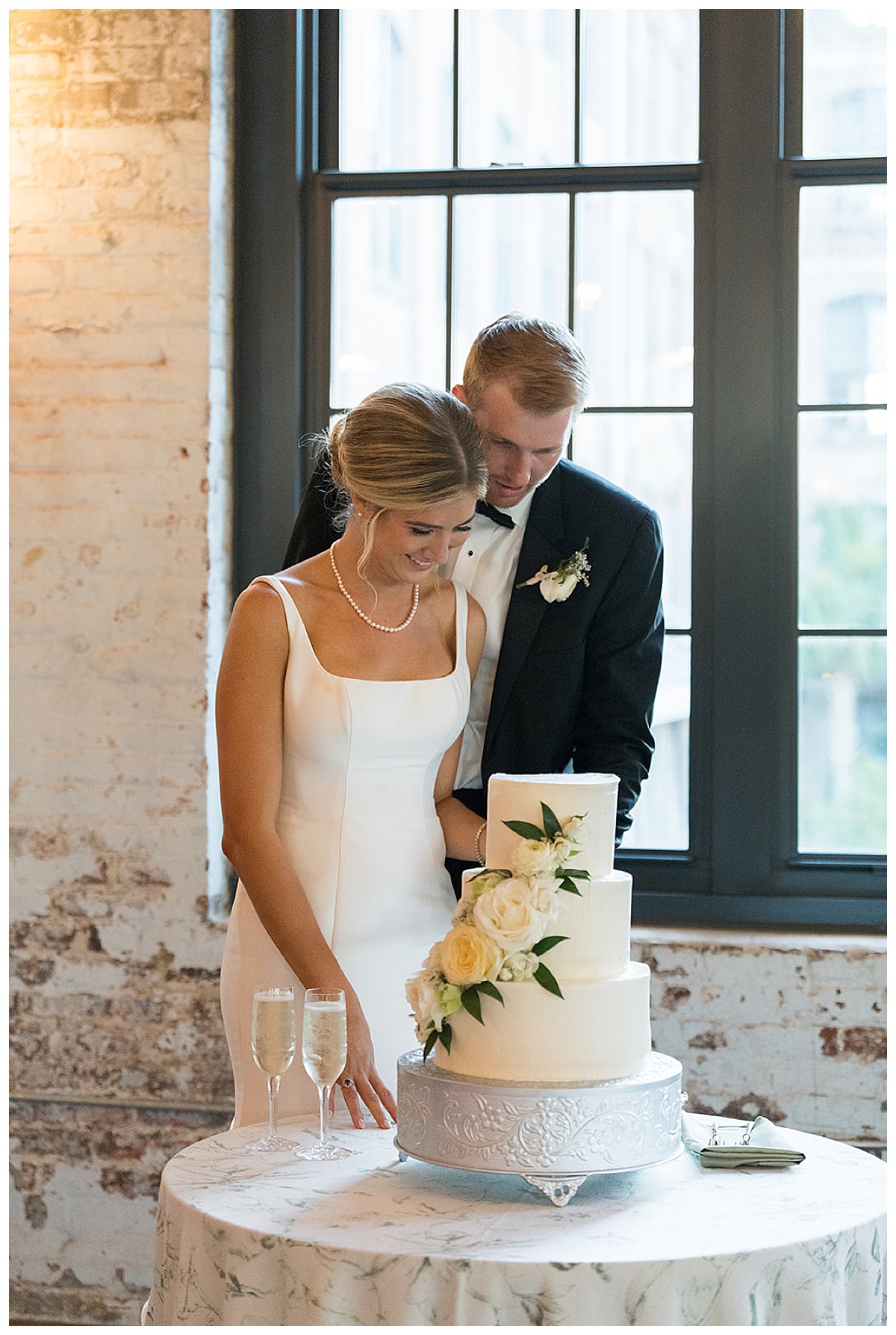 Cake Cutting at Cedar Room Charleston Wedding Reception